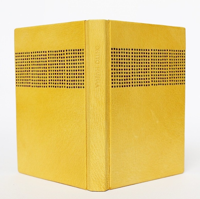 Sewn boards binding in fine goat skin by Kaija Rantakari, 2016. The binding features 768 binary code leather onlays and typed endpapers with
