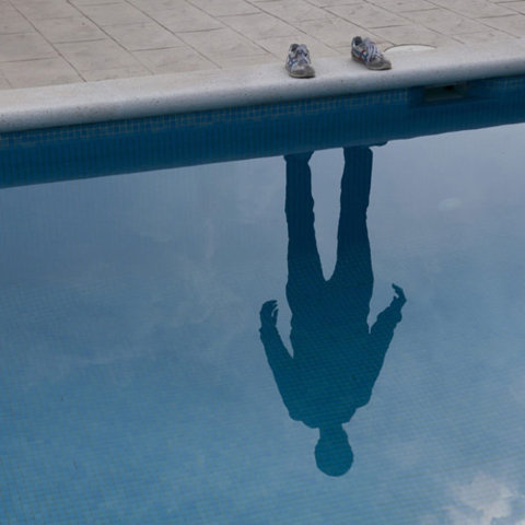 human reflection in water