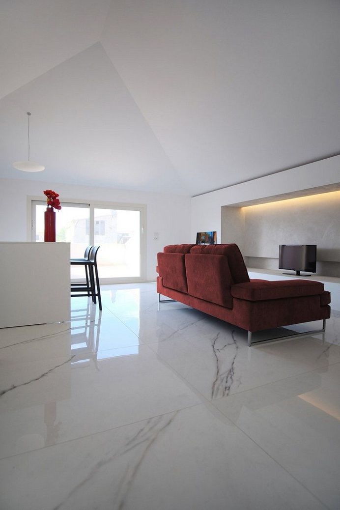 Renovation of an Attic Apartment in Corinaldo, Italy 9