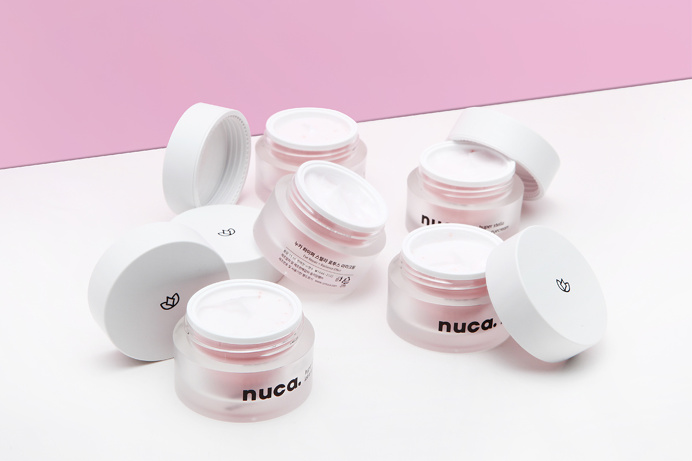 nuca Brand corporate Design branding by eggplant factory beauty cosmetic cosmetics beautiful pink violet typography minimal japan branding g