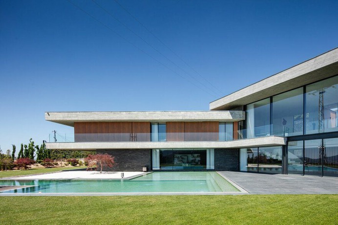 V-Shaped Concrete House in Braga With Extensive City Views