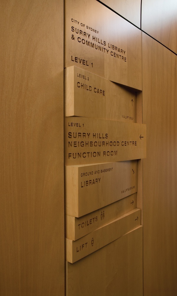 Wood signage, shifting panels, wood burned/engraved names lobby directory Sydney library and community center #burnedengraved #lobby #shifting #center #sydney #community #wood #directory #panels #library #signage #names
