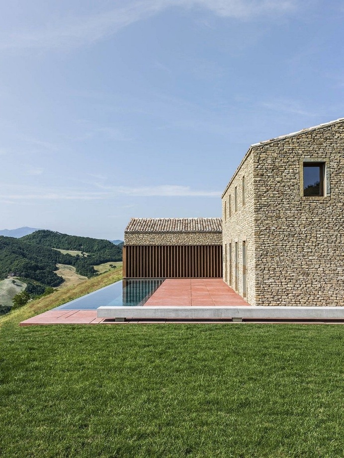 This Italian Stone House Celebrates Vernacular Architecture in a Modern Way