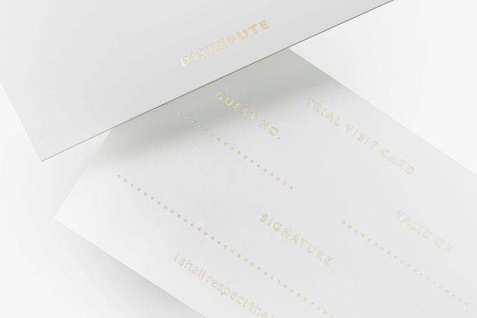Brand identity and visitor's card with gold foil detail designed by London-based studio Two Times Elliott for Soho members bar Disrepute