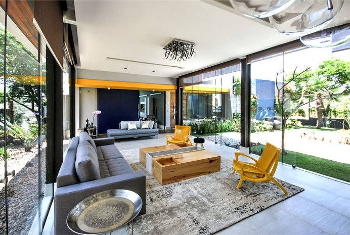 Brazilian House with Stylish Architecture and Rustic Materials vital yellow color chairs #interior #design #decor #living #livingroom #room