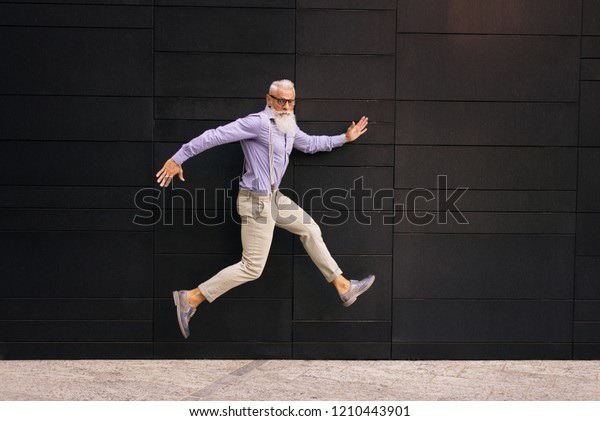 Handsome senior man portrait - Youthful and stylish man in the sixties, concepts about lifestyle, seniors and business