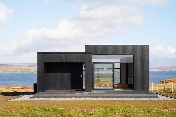 Modern Vacation Cabin Modeled on Traditional Scottish Longhouses