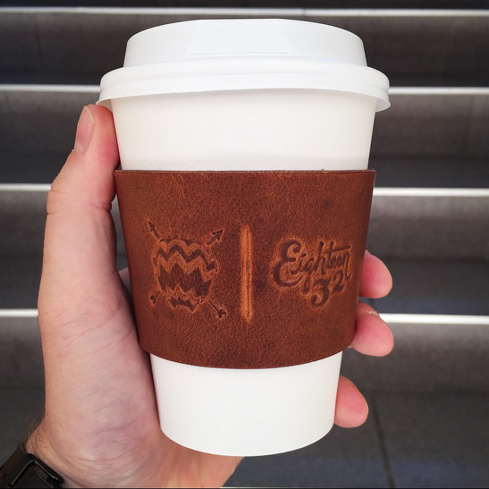 Custom Leather Coffee Cup Sleeves for Vagabond Coffee Co. by Eighteen32. #coffee #espresso #branding #sleeve #leather #vagabond #logo #stamp