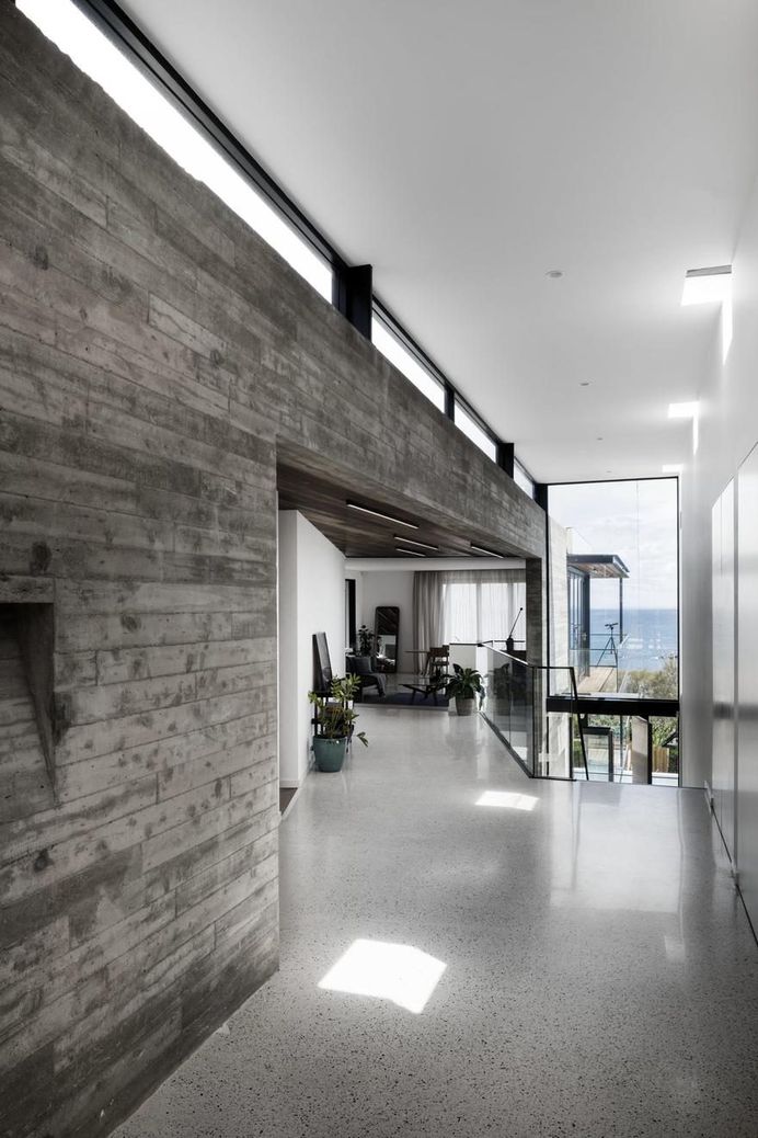 Two Angle House Featuring Provocative Architecture Using Concrete, Stone and Wood 6