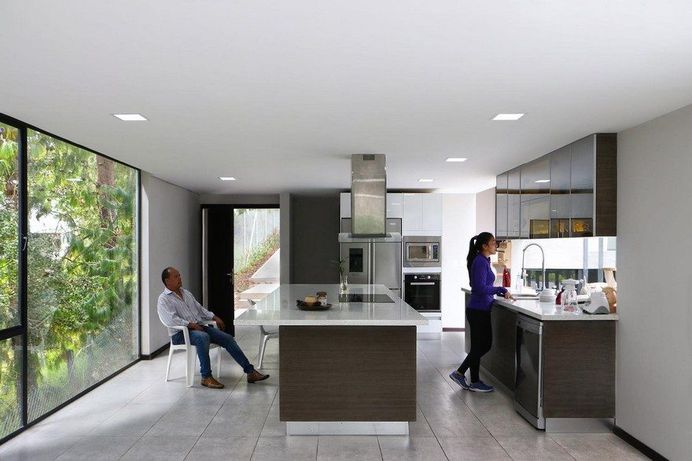 Contemporary Concrete House Suspended Like a Cloud Over Landscape 6