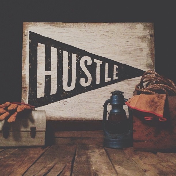 Hand-painted Hustle Flag on wood. #neuarmysurplusco #hustle #vscocam