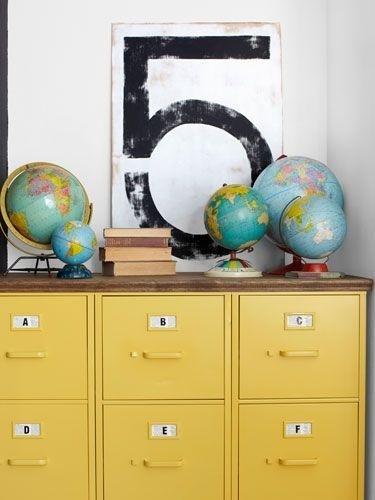 Three filing cabinets spray-painted yellow and topped with plywood #cabinet