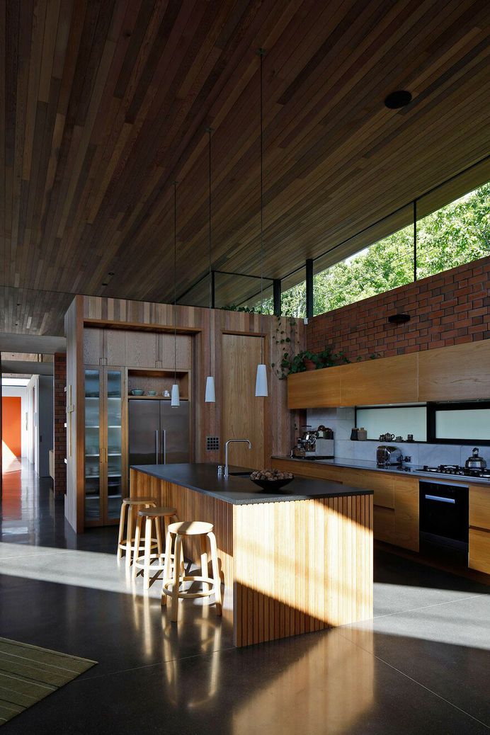 Walled Courtyard House Organised Around a Central Pool 6