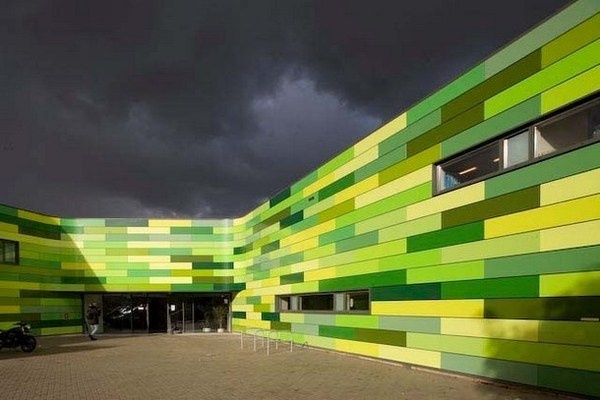 Animal Refuge Centre in Amsterdam with bright green exterior #bright #architecture #art #exterior #buildings