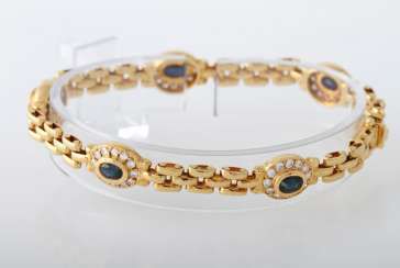 Bracelet yellow gold 18 K with 5 oval fac. Safiren approximately 2.5 cts, and 60 Brill. together. of 1.42 cts, TW-W / vsi-si.