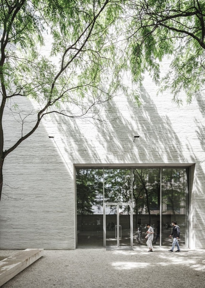 Massive gray brick wall. Kolumba Museum by Peter Zumthor. © COAST Studio. #courtyard #brick