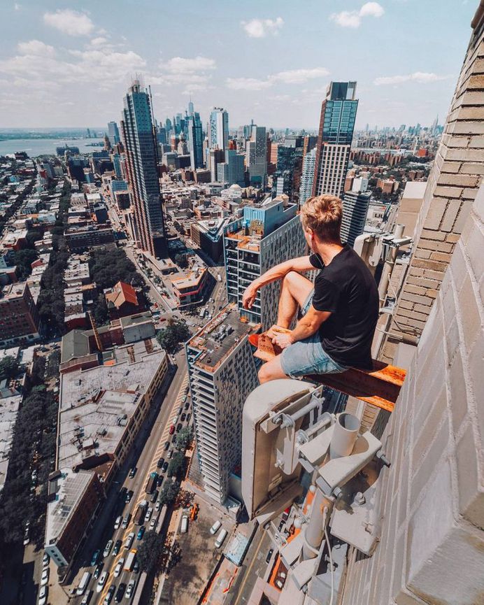 Daredevil Photographer Denis Krasnov Climbes Huge Skyscrapers To Take Stunning Photos