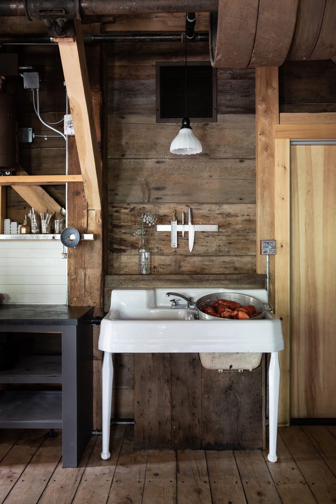 Lobsters cool in the farmhouse sink, which French found at a house set to be demolished in Massachusetts.