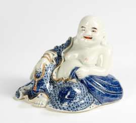 Under glaze blue decorated porcelain figure of seated Budai #Sets #Tea sets #Porcelain sets #Antique plates #Plates #Wall plates #Figures #Porcelain figurines #porcelain