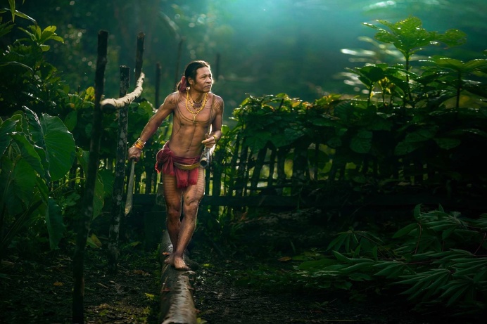 Photographer Documents The Nomadic Life of The Mentawai Tattooed People