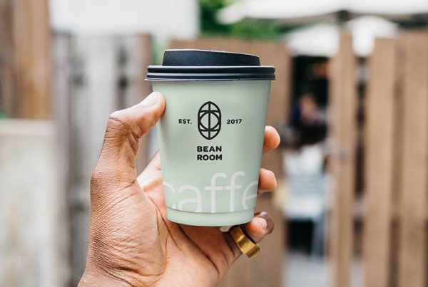 Hand Holding Cup Mockup