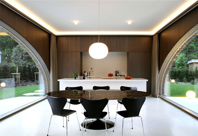 Symmetrical Tripartite Villa Moerkensheide wooden wall paneling living space #interior #kitchen #design