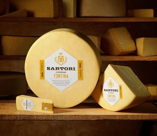 Sartori - TheDieline.com - Package Design Blog #white #label #crest #seal #gold #logo