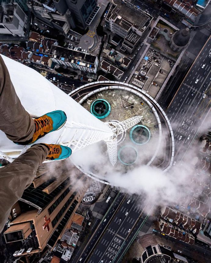 Daredevil Building Climber: Roooftop Photography by Andrej Ciesielski