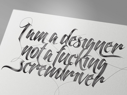 Typography inspiration example #331: I am a designer, not a fuc***g screwdriver on Typography Served #ink #white #script #quote #black...