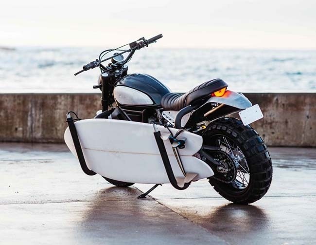 Feast your eyes on the #TransScrambler, a surf-ready custom bike from the Australian headquarters of Deus. #bikelife #blackout #luxuryes