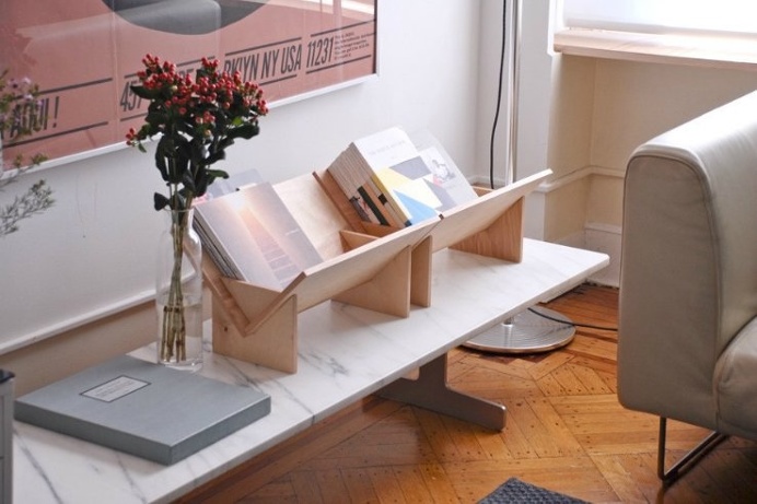 Are you a #book lover with an affinity for #design? This sleek, #minimalist #bookcase allows you to display any book no matter its size!