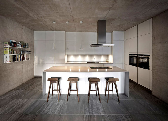 Suburban Home with Concrete Structure that is Exposed Throughout the Interior westmorland house kitchen #interior #kitchen #design