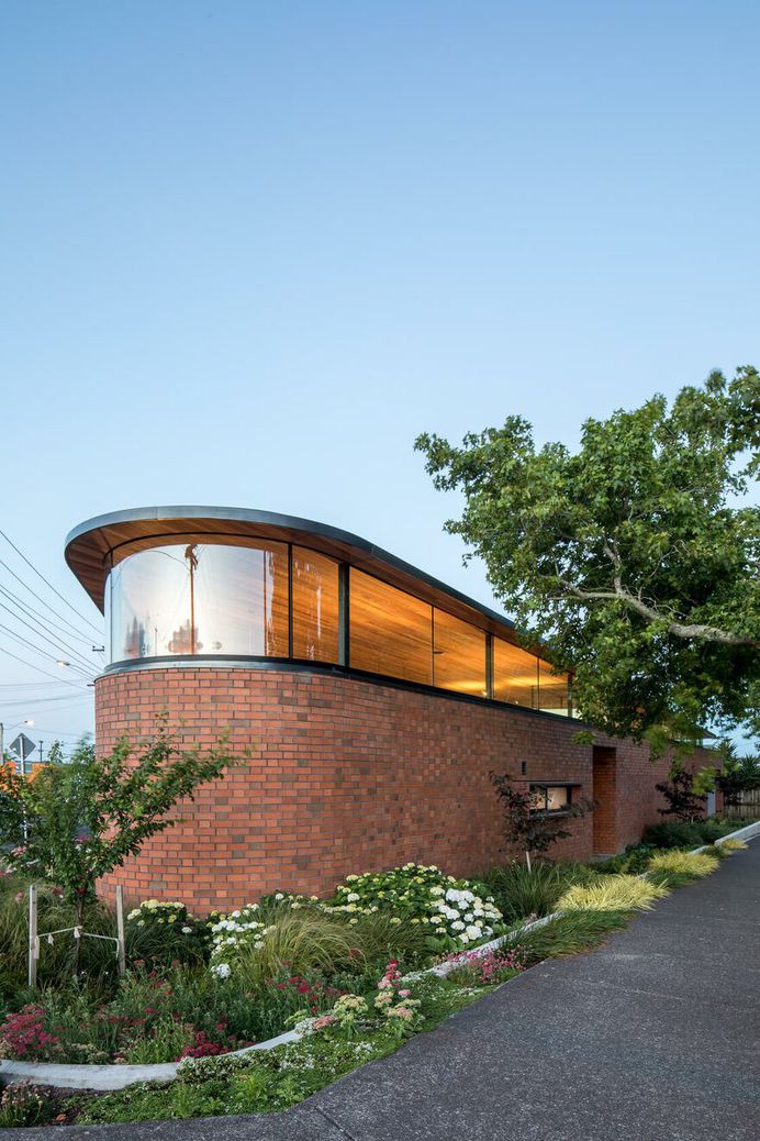 Walled Courtyard House Organised Around a Central Pool 1