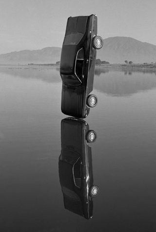http://www.artsjournal.com/anotherbb/assets_c/2009/05/cardrop-7246.html #gonzalo #white #house #black #muerte #vida #cars #art #short #campari #lebrija #life