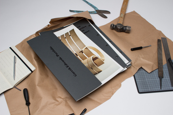 Gareth Edwards Portfolio #binding #screws #portfolio #book #black #on #passport #editorial #foil #typography