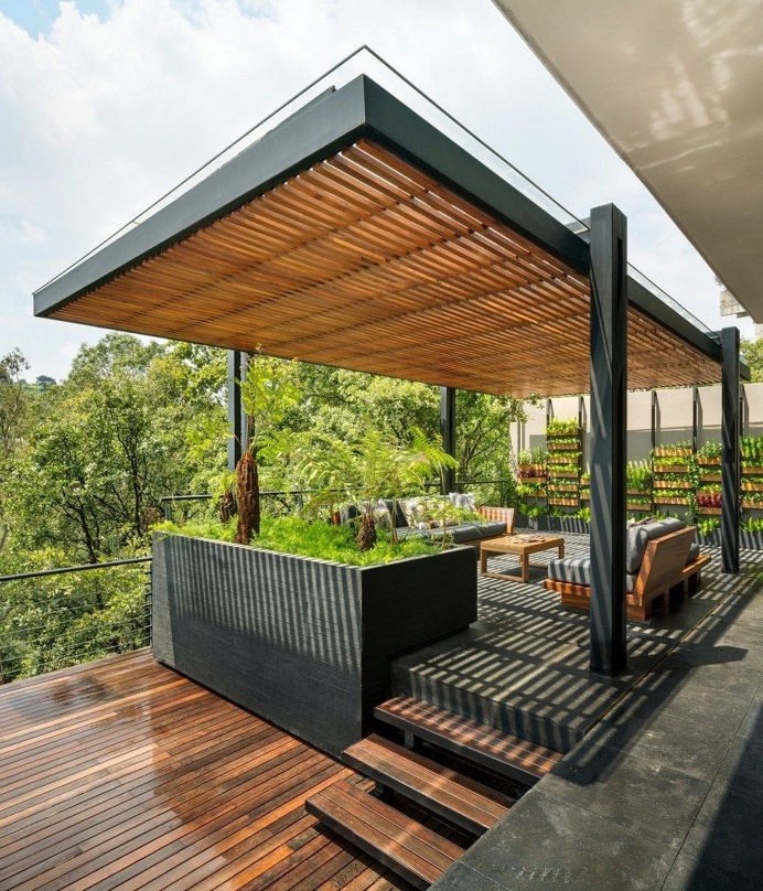 Jardin Apartment Provides a Close Connection of Living Spaces with Patios and Interior Gardens