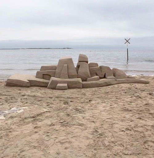 Typeverything.comSand sculpture graffiti by DAIM. #daim #sand #writer