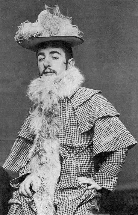 Toulouse-Lautrec in hat and boa. (Jane Avril's?) c1892,   

