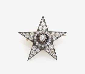 STAR-SHAPED BROOCH WITH DIAMONDS