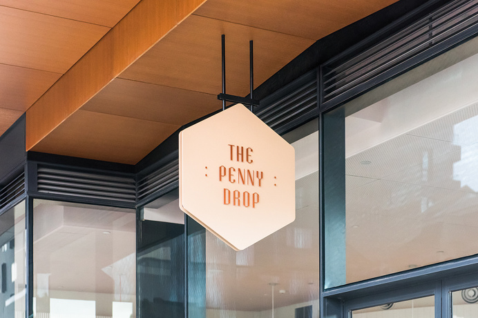 the penny drop cafe by pop and pac melbourne australia beautiful interior design branding logotype copper wood graphic modern coffee inspira