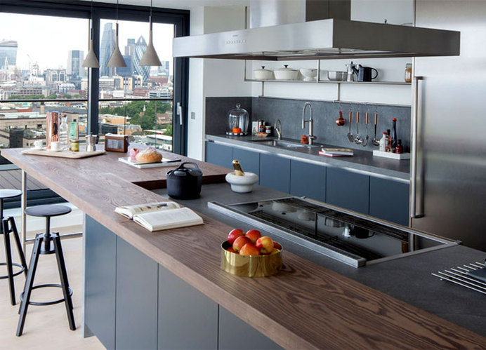 Luxury Penthouse Designed by Amos and Amos kitchen range cooker basaltina stone worktops #interior #kitchen #design