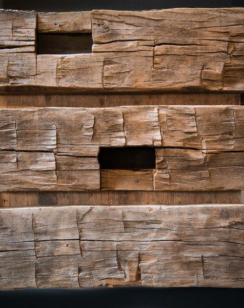 Score marks give hand hewn timbers their signature look and texture prized by homeowners.