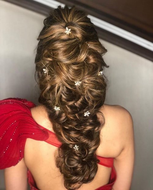 Loosely Tied French Braid Decorated With Flowers