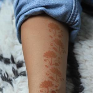 Jasmine - floral henna design on arm Garden up your wrist or ankle with a Mihenna floral bangle henna design today. Our dainty Jasmine Sticker Stencil makes DIY body art easy and fun for everyone!