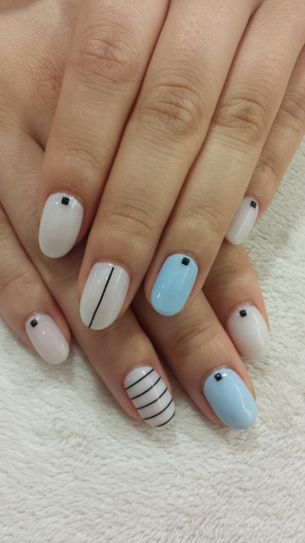 Love simple and clean nail look? These artistic nails will fit you perfectly while going to school or work. Laced with pale and plain colors