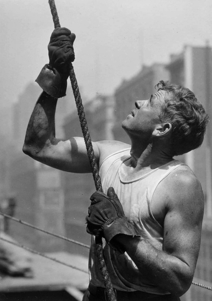 Lewis W Hine: Construction Worker Gripping A Rope At Work On The Empire State Building, 1931