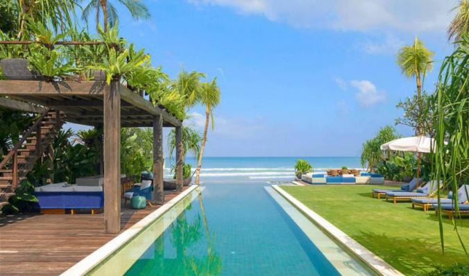 This Beachfront Seminyak Villa is a dream for those who love to entertain, with a fully staffed commercial kitchen, wine room, bar and more. Contact Villa Getaways for Booking.