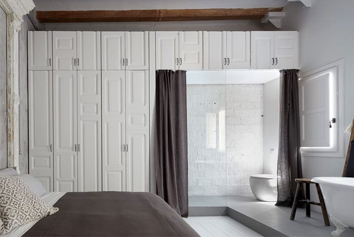 Brick Walls and Wooden Roof Structures Give Character to Barcelona Apartment #bedroom #interior #decor
