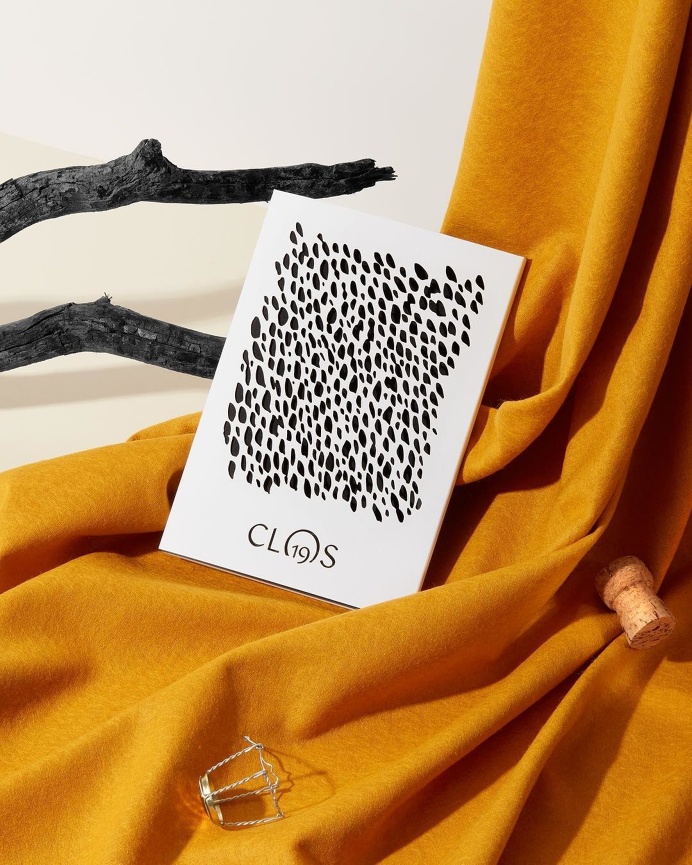 Commission on Instagram: "Wine tasting notebooks for @clos19official with laser-cut sleeves. Printed by our good friends in Paris @imprime #clos19