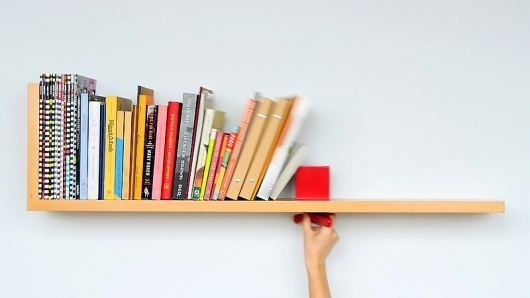 Wall-Mounted Shelf Prevents Toppling Books With Sliding Lock | Co.Design: business + innovation + design #sehfl #design #book #clever #bookshelf
